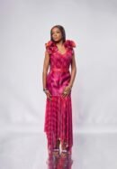 Model in the JIVA fuchsia organza and mesh high-low skirt